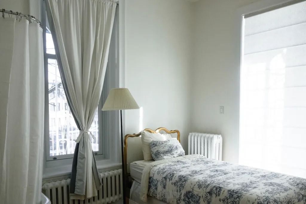 Stripped and decluttered bedroom prepared for bed bug heat treatment in Fort Myers FL