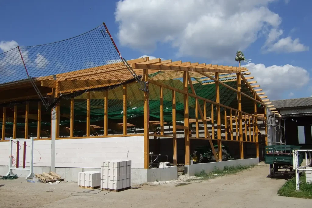 Timber framing going up on a construction site — the pre-drywall window for pest prevention in Lakeland FL