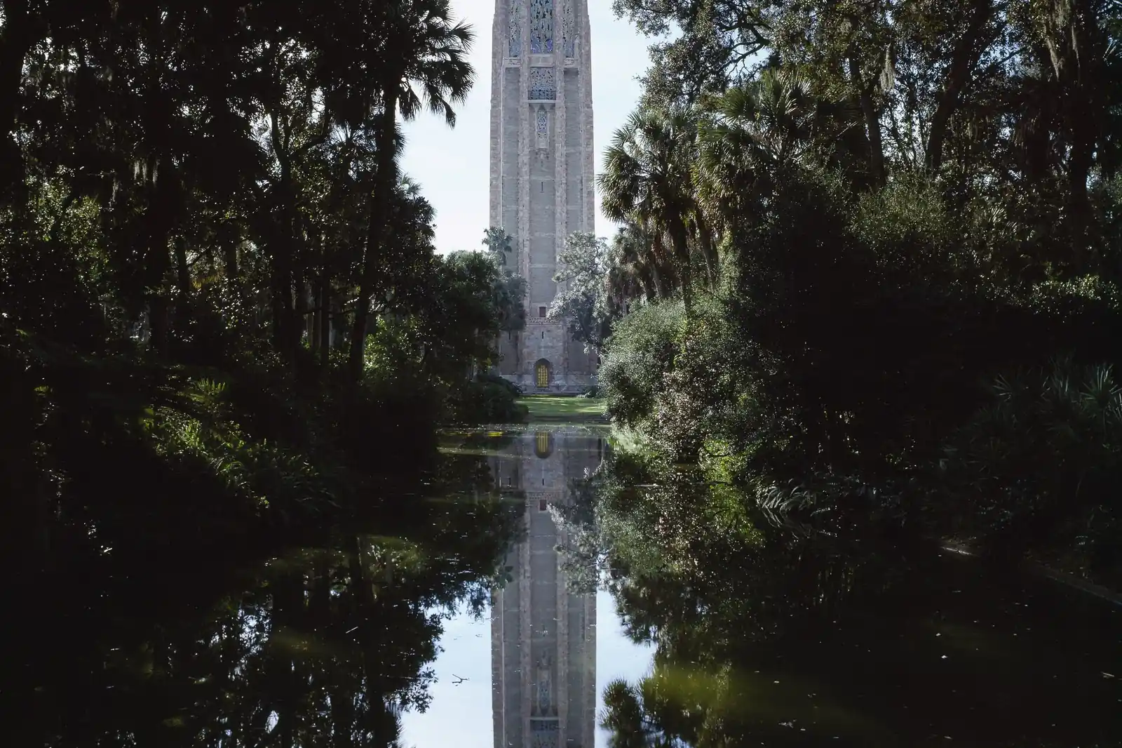 Bok Tower over the reflecting pool in Lake Wales — the Ridge landscape local pest control works in