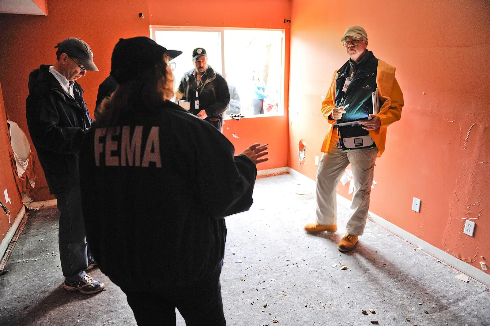 Inspectors walking a property interior — what a pre-listing pest inspection covers before a Lakeland FL sale